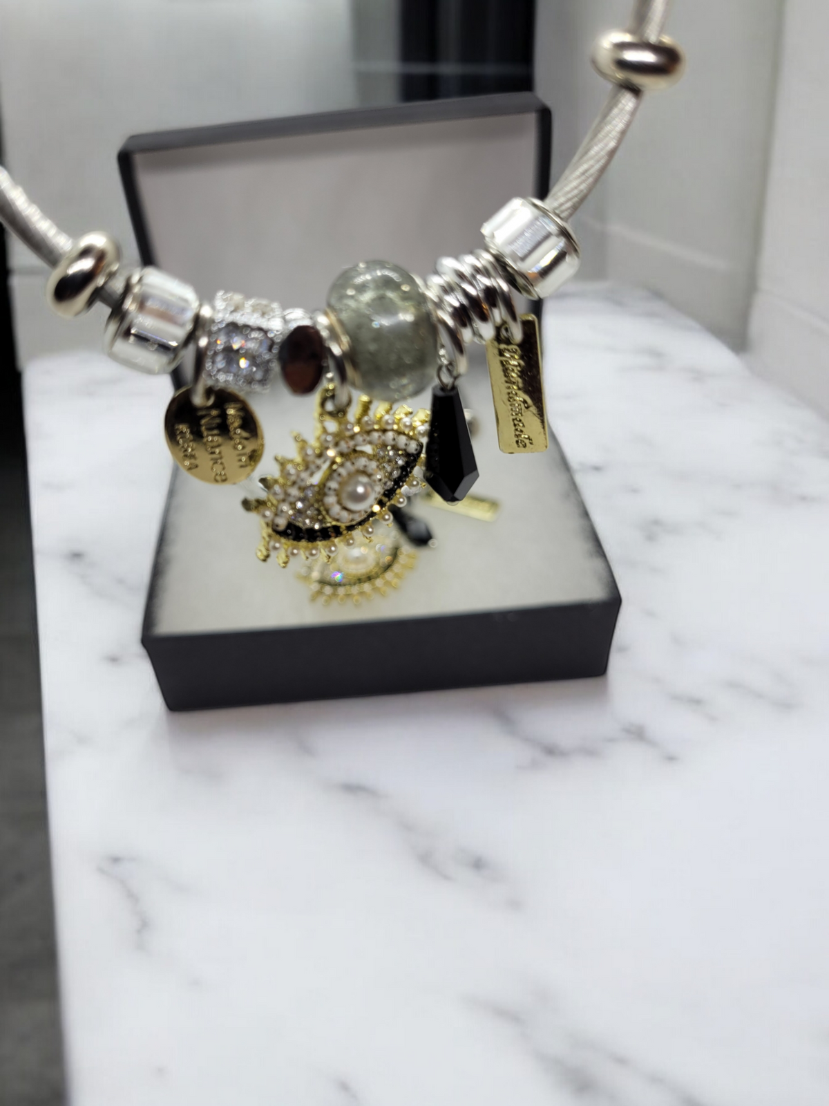 Black and gold evil eye bracelet