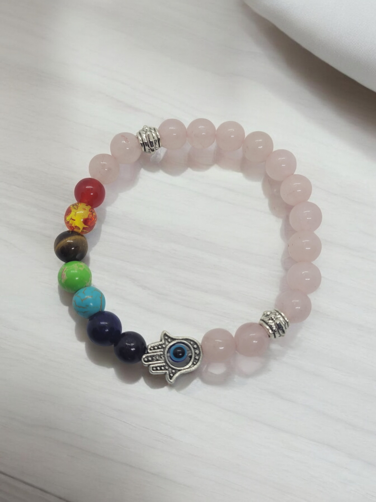 Pink beaded evil eye bracelet